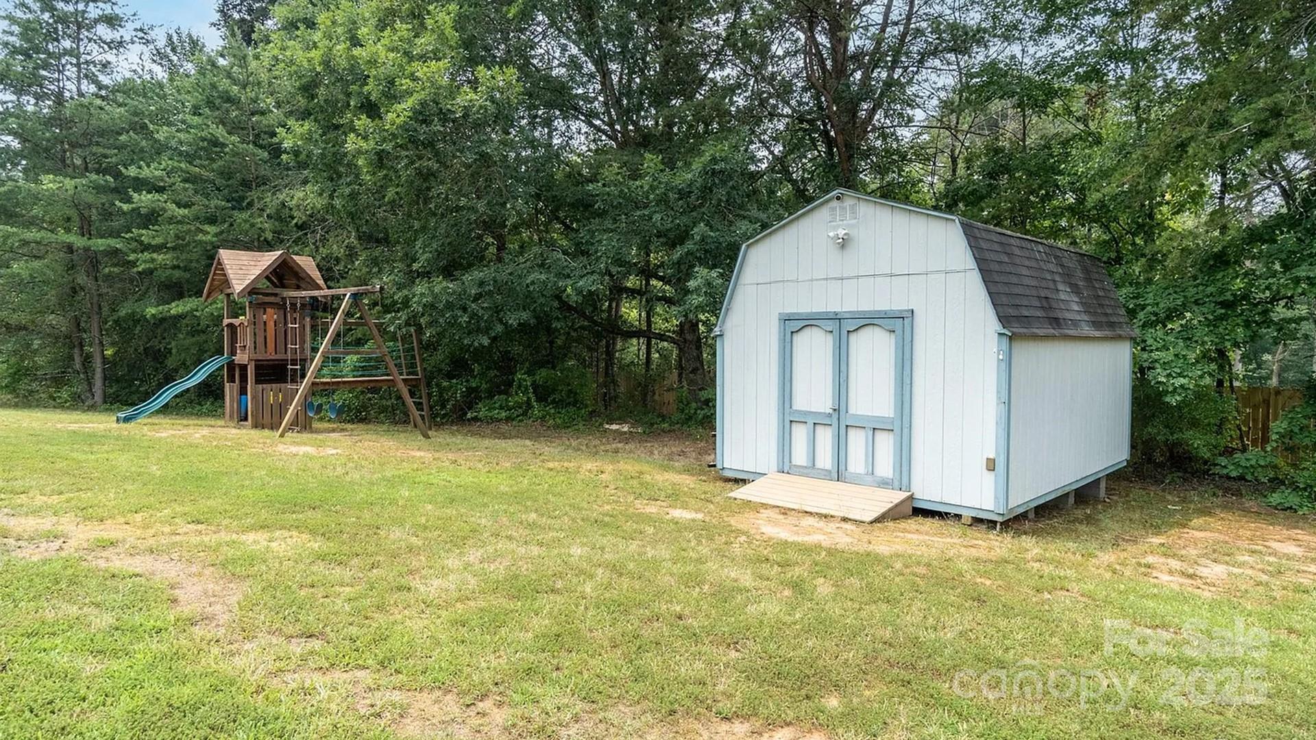 4220 Mt Beulah Road Maiden, NC 28650 - Photo 10 of 13 a front view of a house with garden