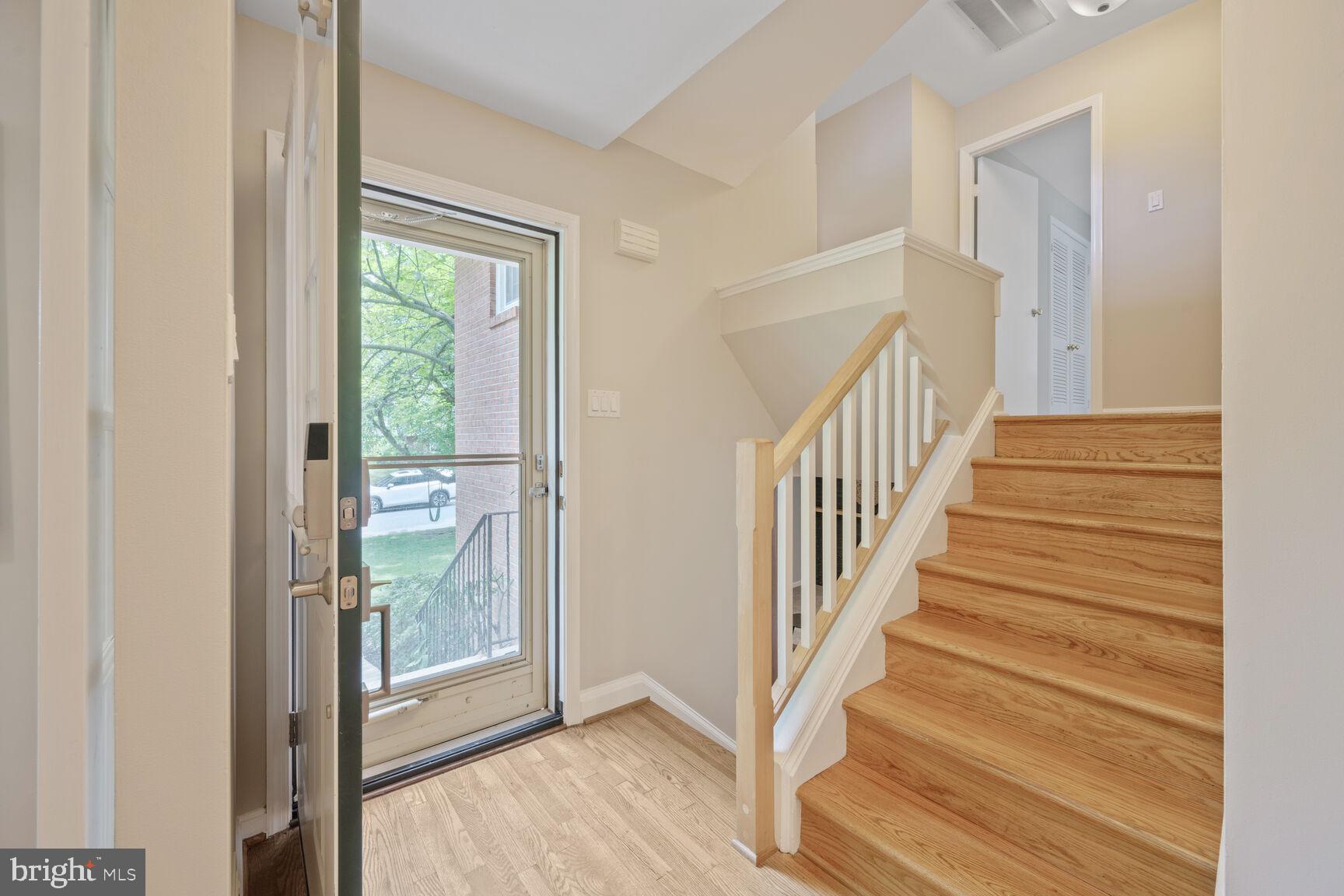 10412 Kinloch Road Silver Spring, MD 20903 - Photo 3 of 37 a view of entryway with wooden floor