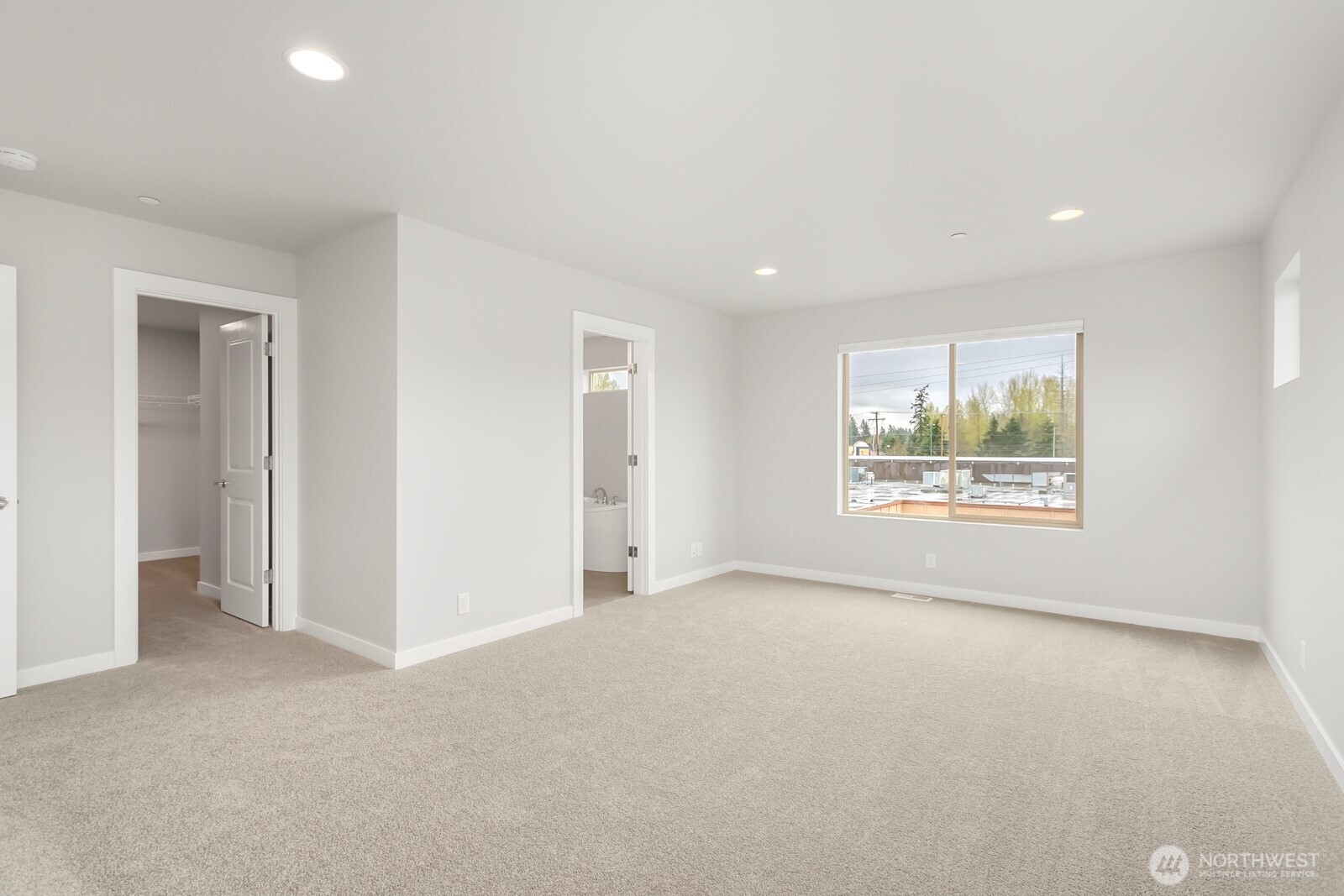 13302 Southeast 238th Place, Unit 7 Kent, WA 98042 - Photo 26 of 37 a view of an empty room with a window