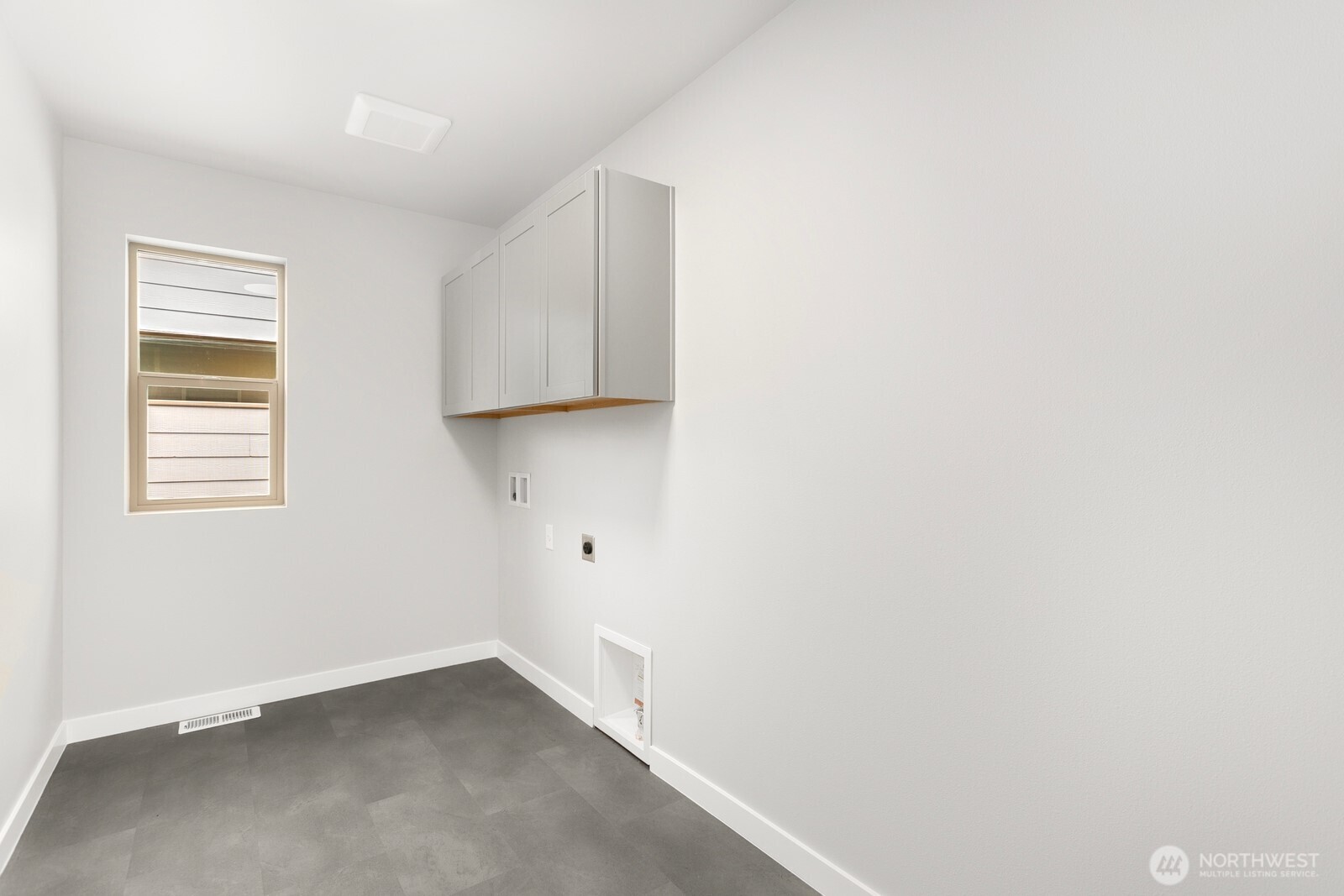 13302 Southeast 238th Place, Unit 7 Kent, WA 98042 - Photo 34 of 37 a view of an empty room with a window