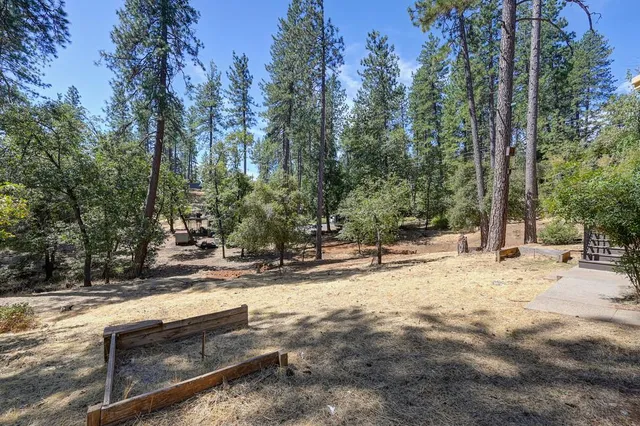 a spacious bathroom with a granite countertop sink a mirror and a