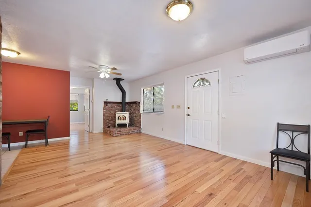 a kitchen with a stove a sink and a refrigerator