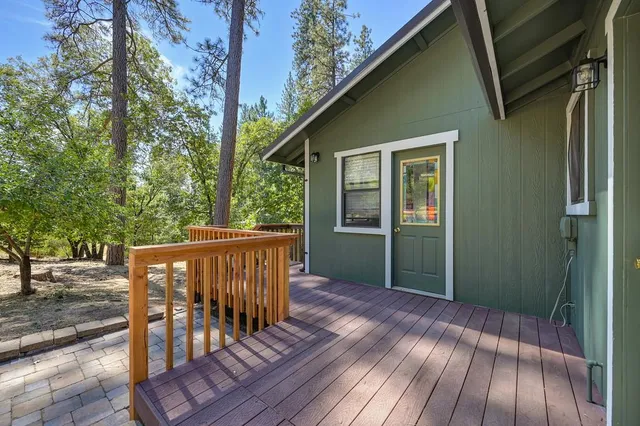 a view of a backyard of the house