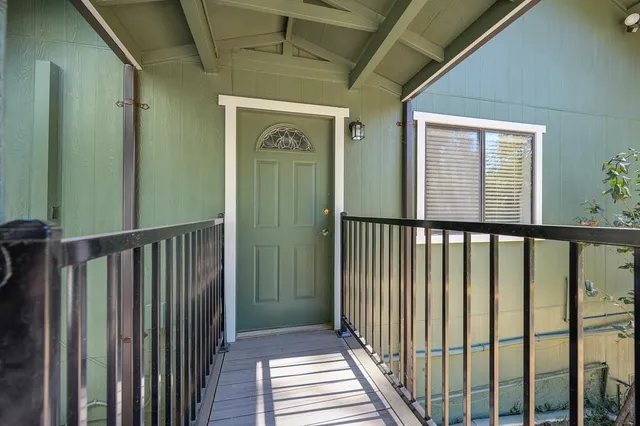 a view of front door and deck