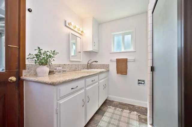 a living room with furniture and a table