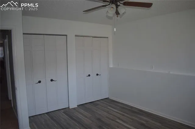 a bathroom with a toilet sink and shower