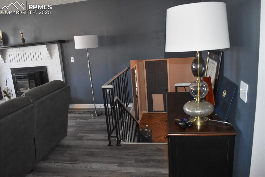 18 Chaparral Circle La Junta, CO 81050 - Photo 8 of 24 a room with furniture mirror and wooden floor