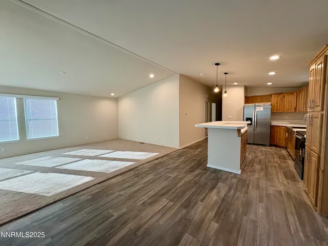 a view of a kitchen and a kitchen