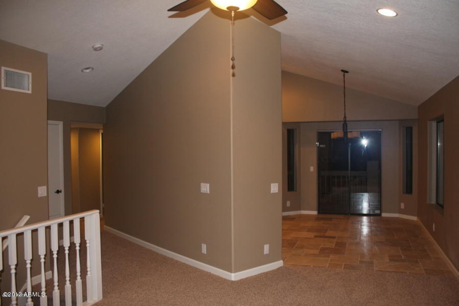 1522 West Del Rio Street Chandler, AZ 85224 - Photo 3 of 11 a view of a room with a hallway