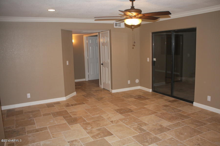 1522 West Del Rio Street Chandler, AZ 85224 - Photo 8 of 11 a view of empty room with a ceiling fan