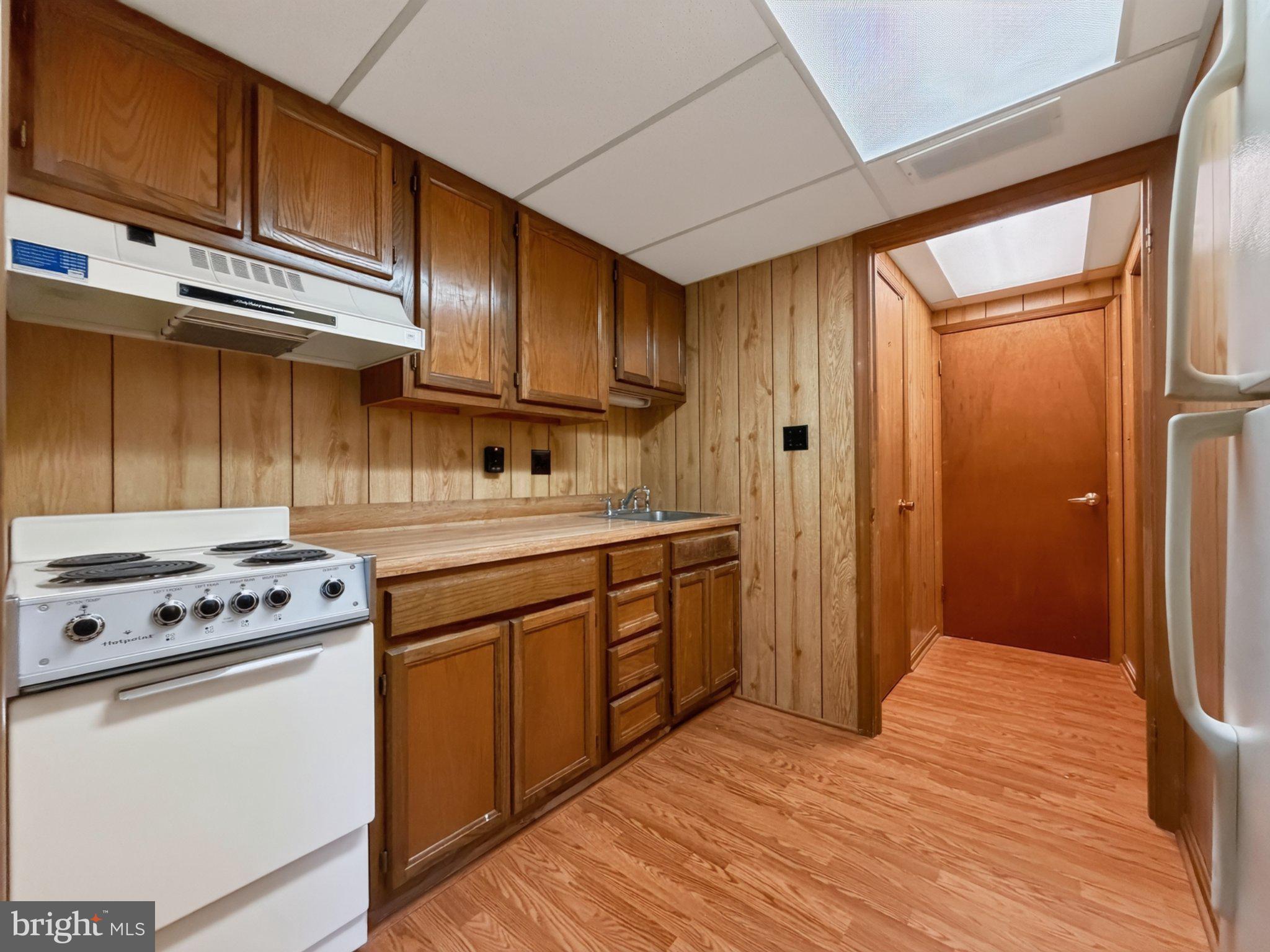 30075 Huntt Road Mechanicsville, MD 20659 - Photo 16 of 21 Cozy kitchen with warm wood accents.