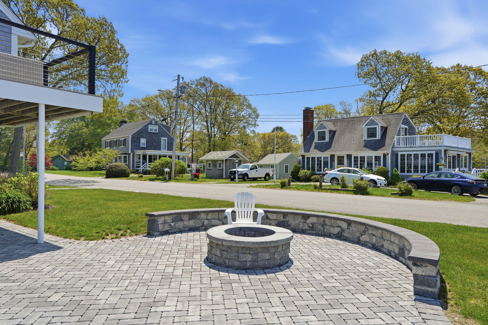 4 Cross Road Bourne, MA 02532 - Photo 37 of 47 a front view of a building with a garden