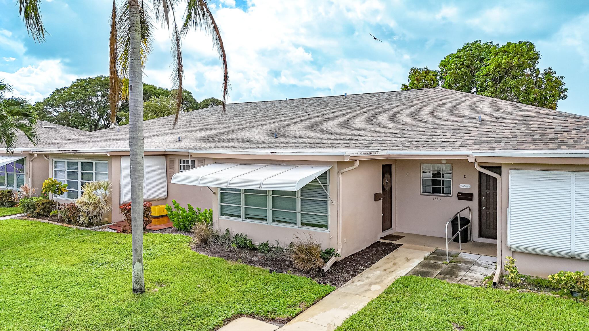 1330 High Point Place North, Unit C Delray Beach, FL 33445 - Photo 3 of 20 front photo