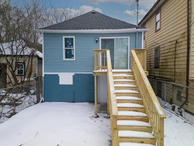 a front view of a house with a door
