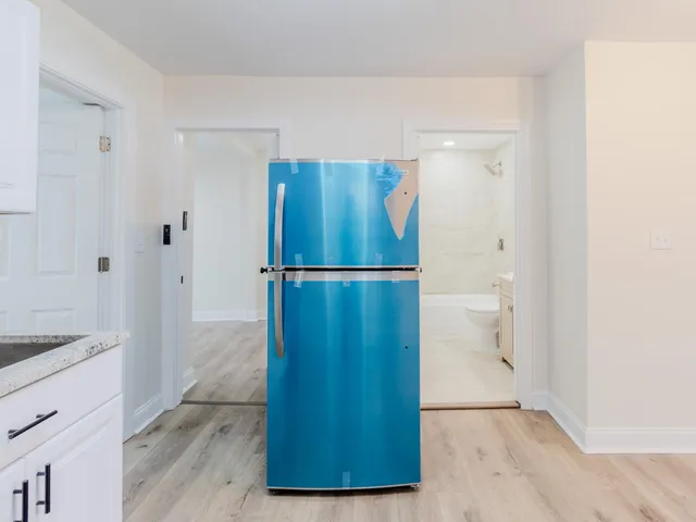 a bathroom with a sink a toilet and a bathtub
