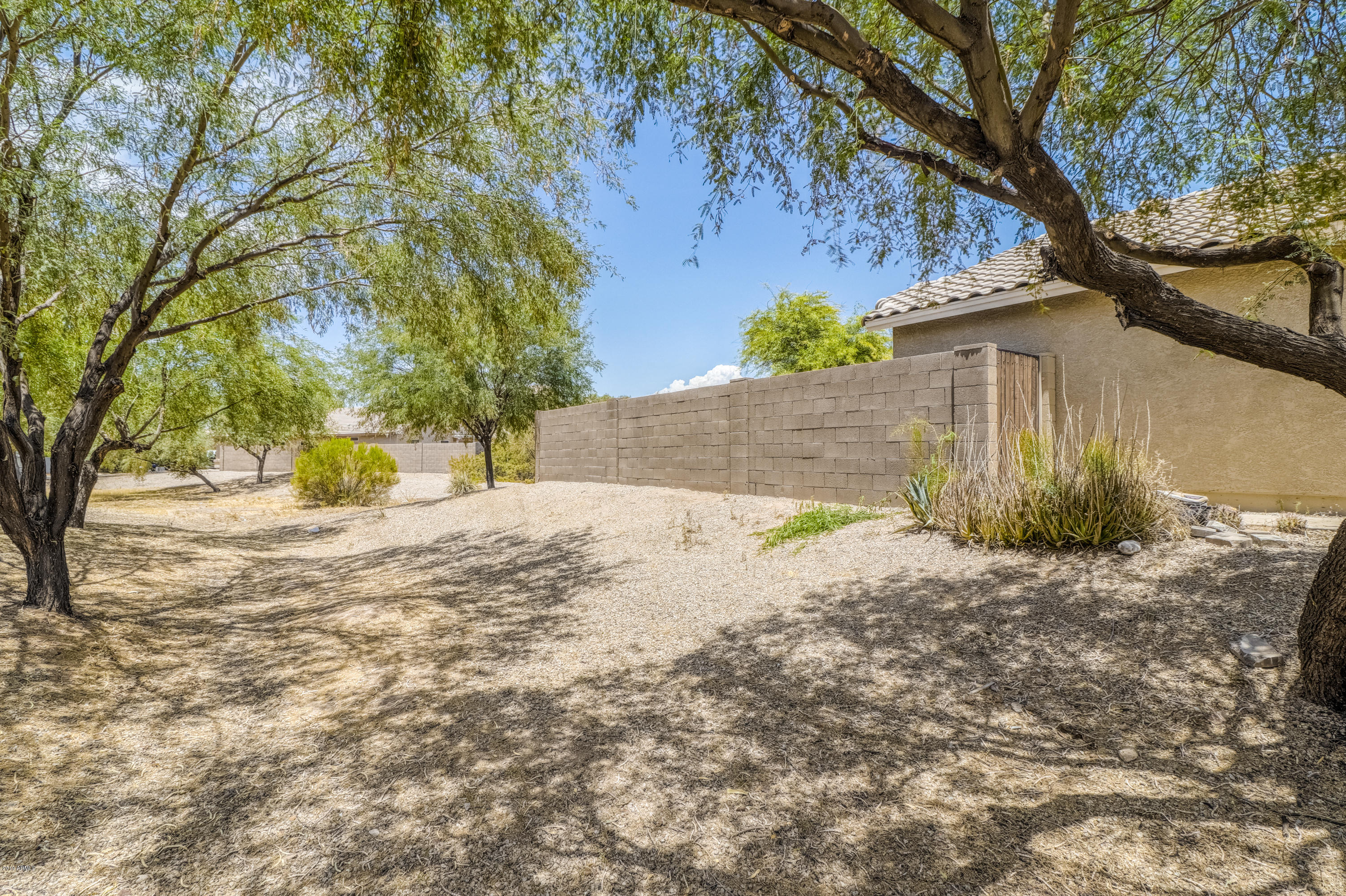 4740 East Silverbell Road San Tan Valley, AZ 85143 - Photo 19 of 25 19 Side of House
