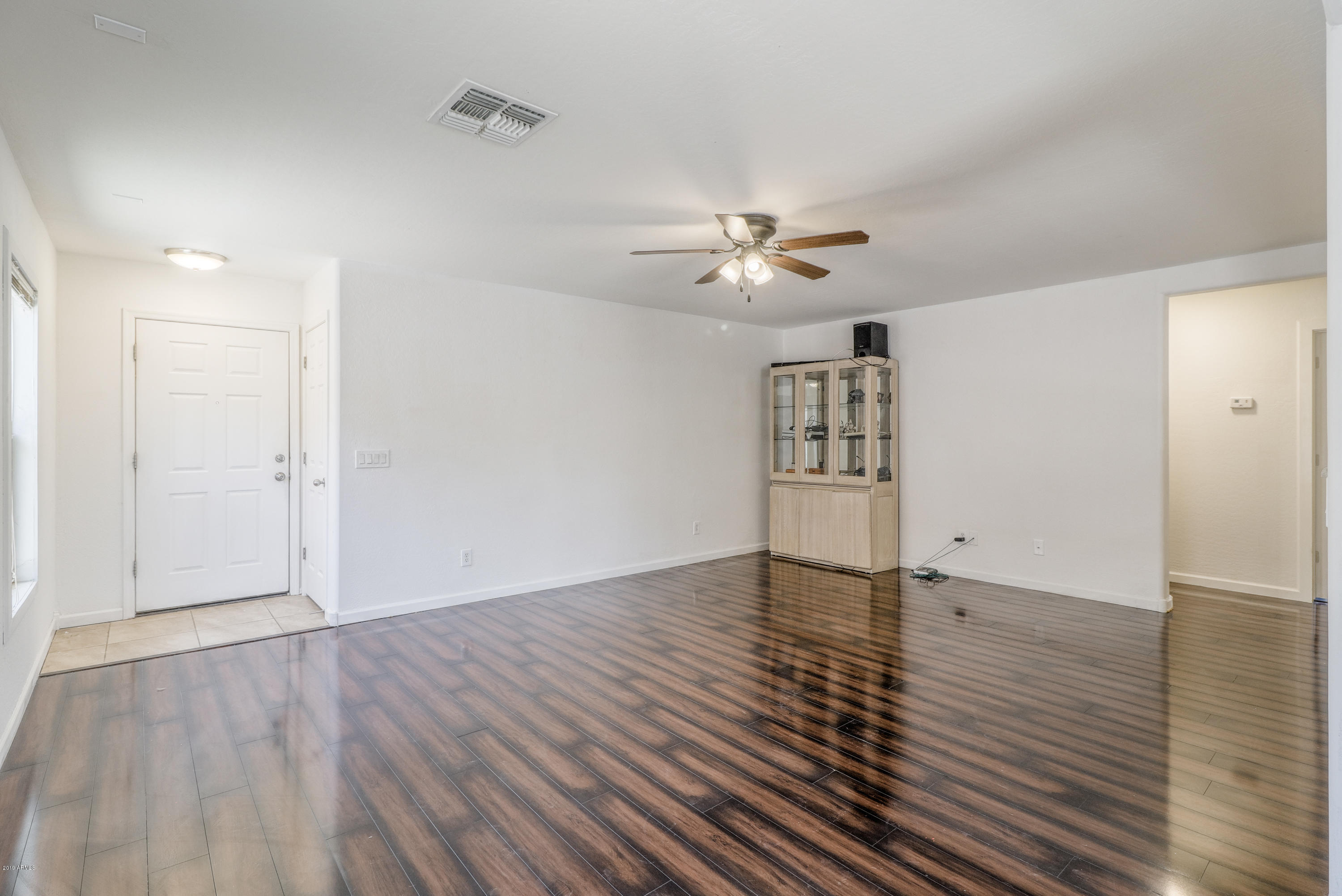 4740 East Silverbell Road San Tan Valley, AZ 85143 - Photo 5 of 25 05 Entry and Living Room