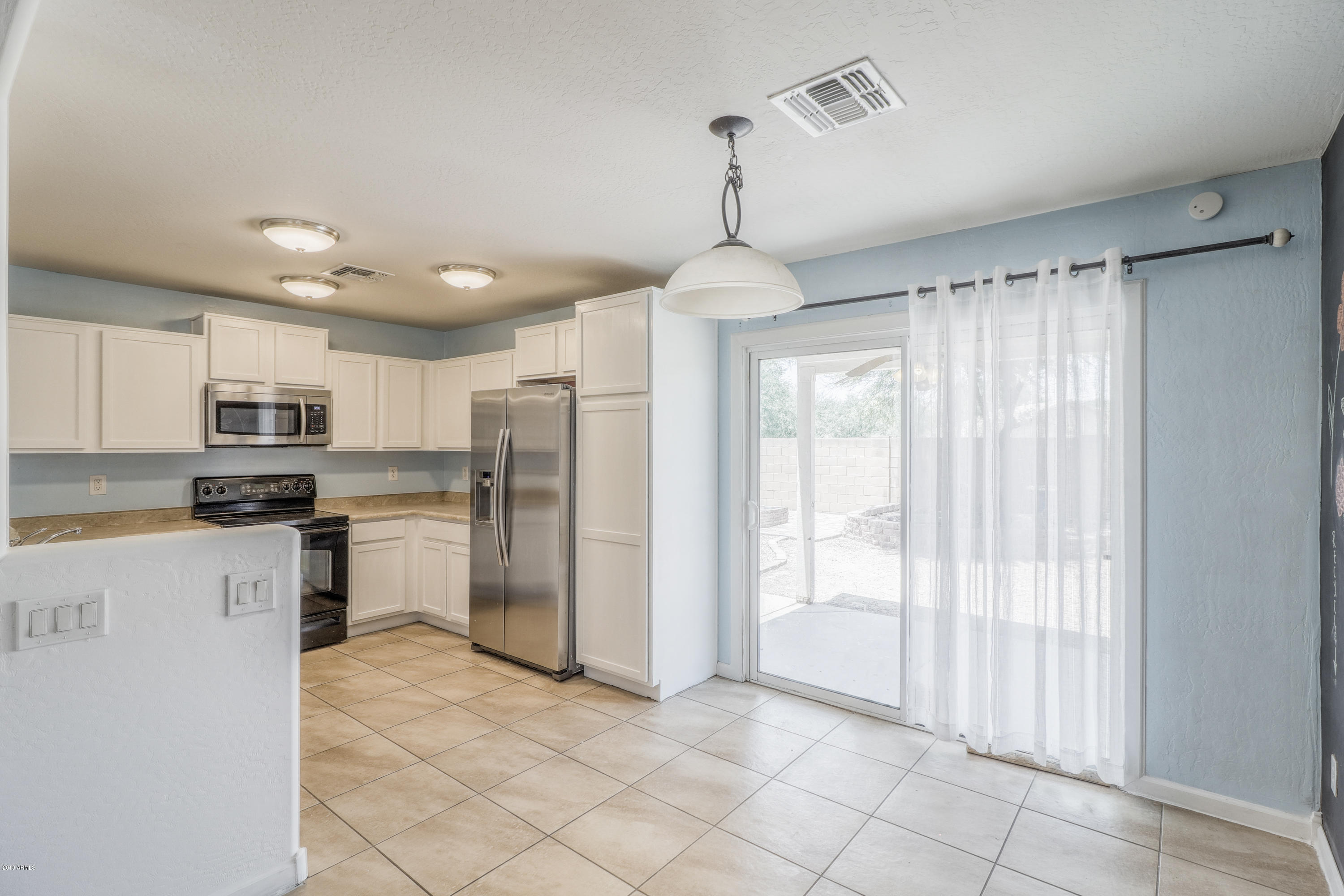 4740 East Silverbell Road San Tan Valley, AZ 85143 - Photo 10 of 25 10 Kitchen and Dining