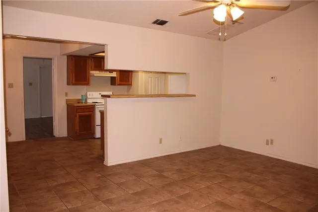 a view of a kitchen with a sink cabinets and a kitchen