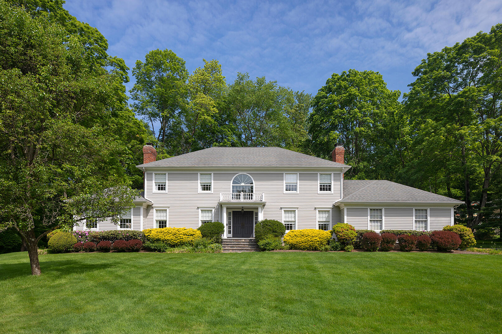 1 French Farm Road Norwalk, CT 06850 - Photo 1 of 33 a front view of a house with a garden