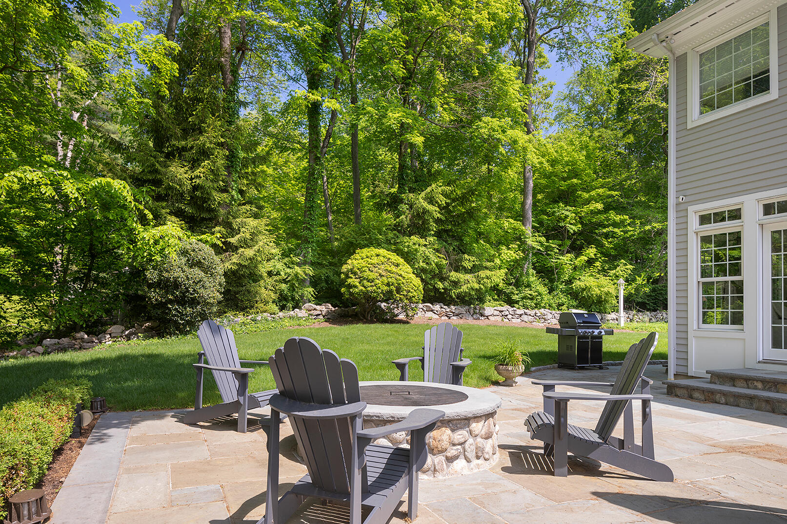 1 French Farm Road Norwalk, CT 06850 - Photo 31 of 33 a view of a table and chairs in backyard of the house