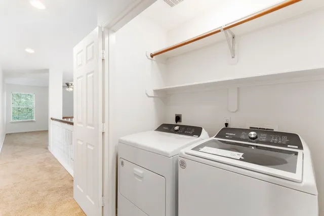 a view of a house with backyard