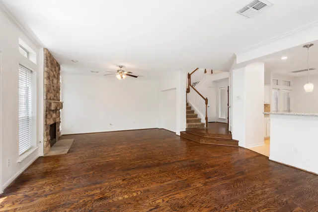 a view of a livingroom with a staircase