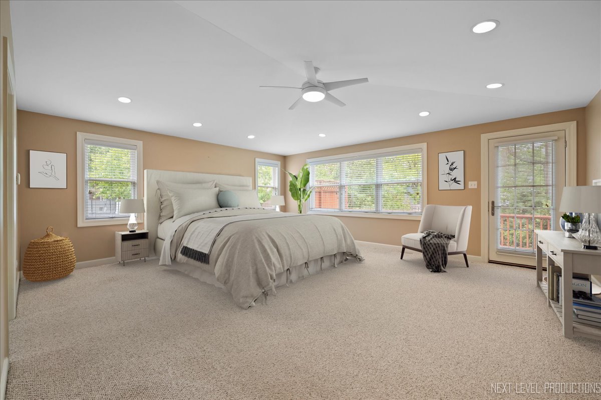 4830 Wolf Road Western Springs, IL 60558 - Photo 20 of 46 a bedroom with bed and a large window