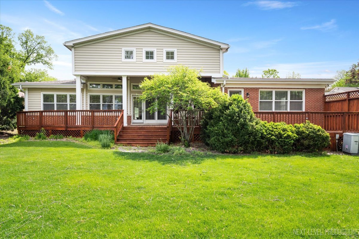 4830 Wolf Road Western Springs, IL 60558 - Photo 38 of 46 a front view of a house with a yard and porch