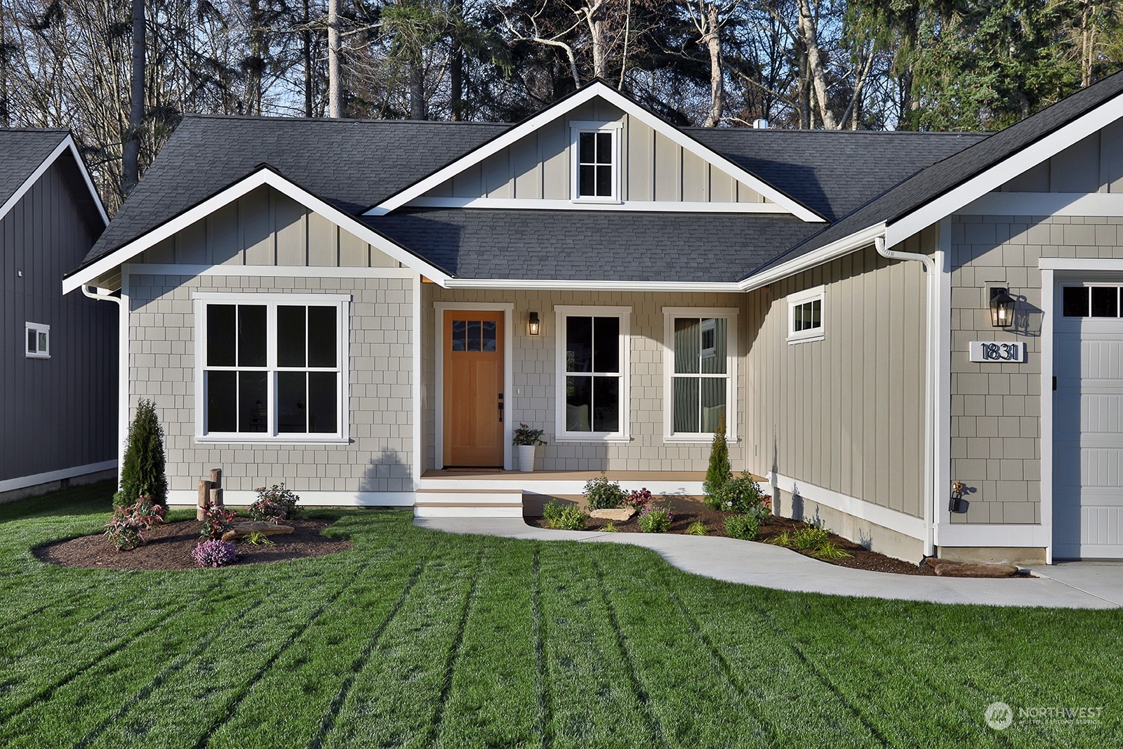 1831 Watkins Road Freeland, WA 98249 - Photo 2 of 37 a front view of house with yard and green space