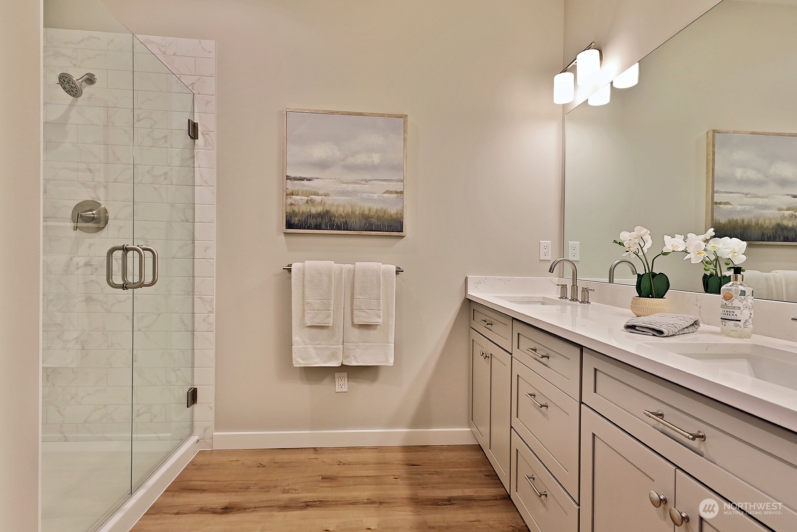 1831 Watkins Road Freeland, WA 98249 - Photo 22 of 37 a bathroom with a double vanity sink mirror and shower