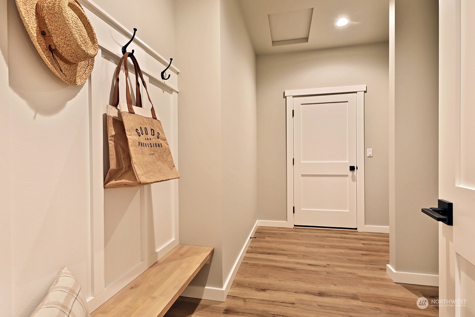 1831 Watkins Road Freeland, WA 98249 - Photo 30 of 37 a view of a hallway with wooden floor and staircase