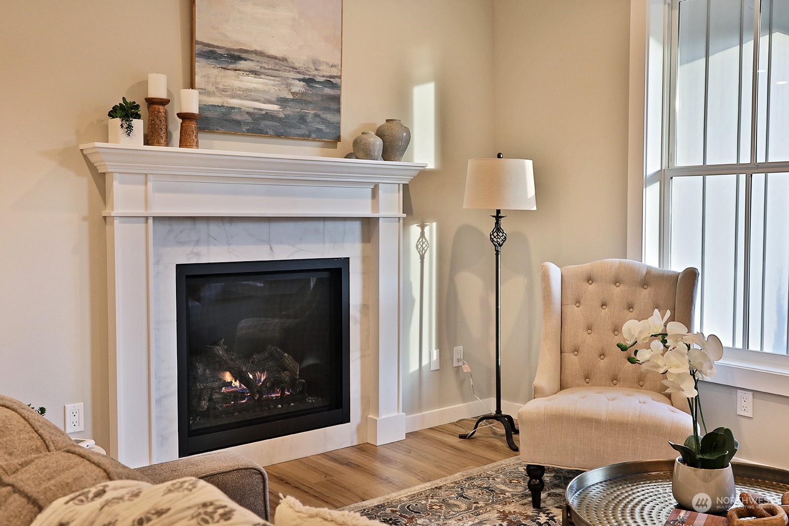 1831 Watkins Road Freeland, WA 98249 - Photo 10 of 37 a living room with furniture and a fireplace
