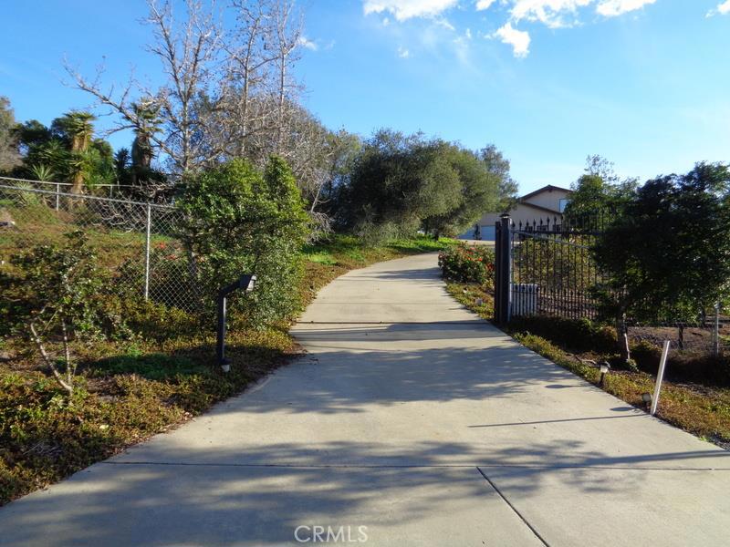 2497 Vía Rancheros Fallbrook, CA 92028 - Photo 1 of 1 a view of a street with houses on both side
