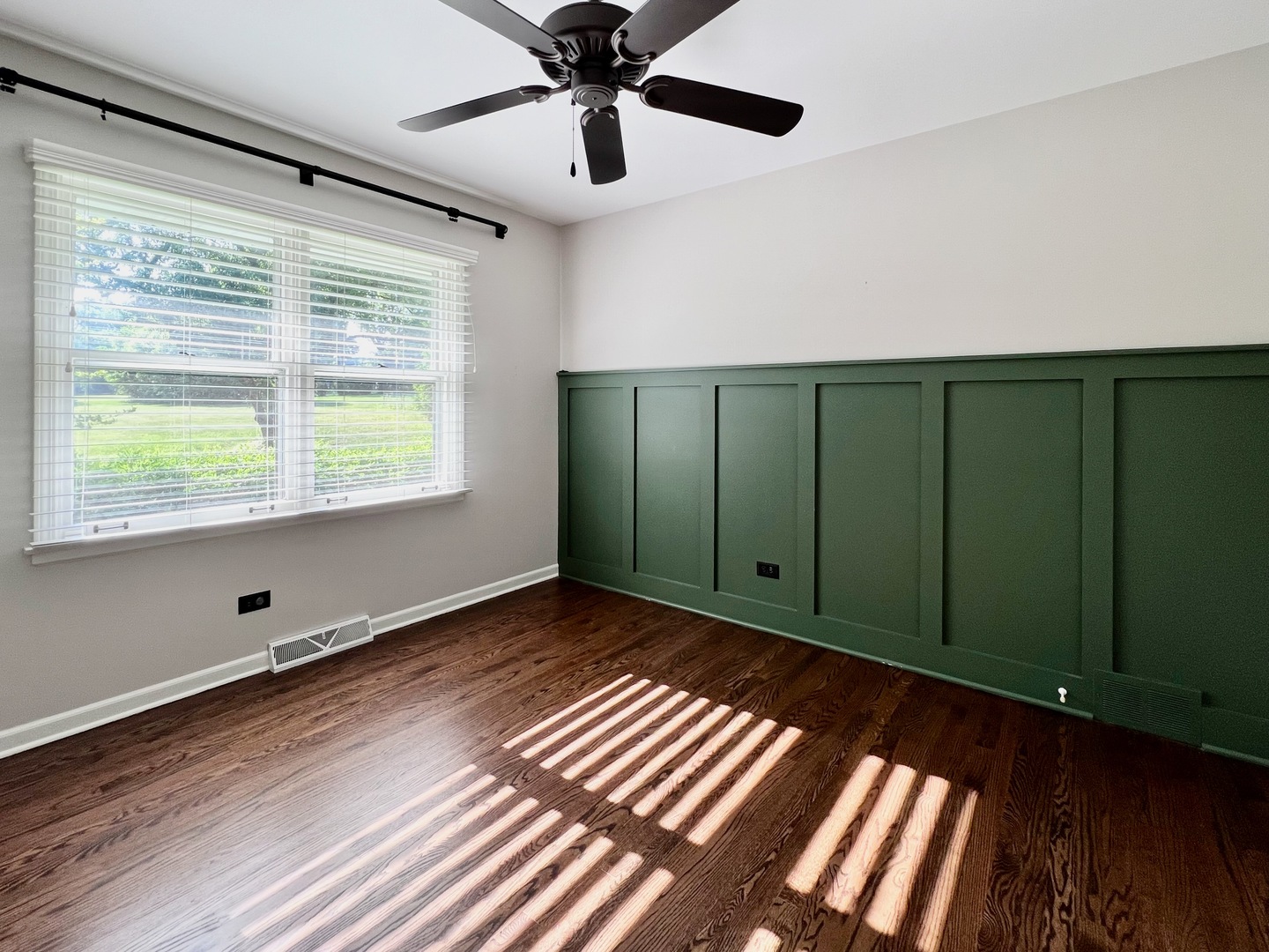 275 Cold Spring Road Barrington, IL 60010 - Photo 19 of 33 a view of an empty room with a window and wooden floor