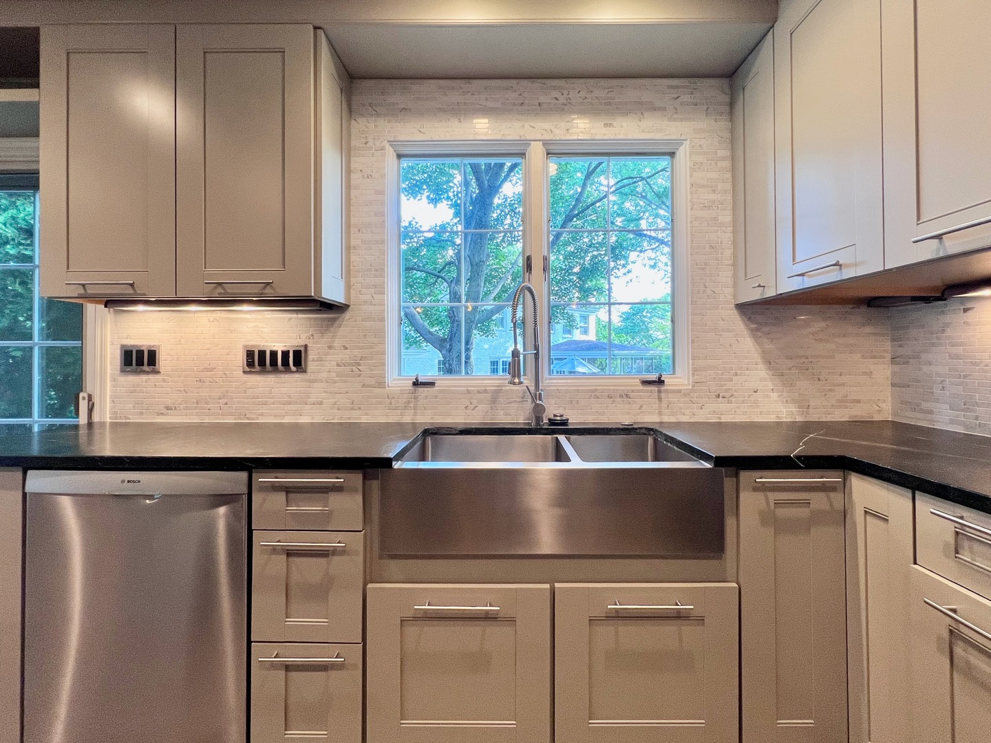 275 Cold Spring Road Barrington, IL 60010 - Photo 4 of 33 a kitchen with a sink and cabinets