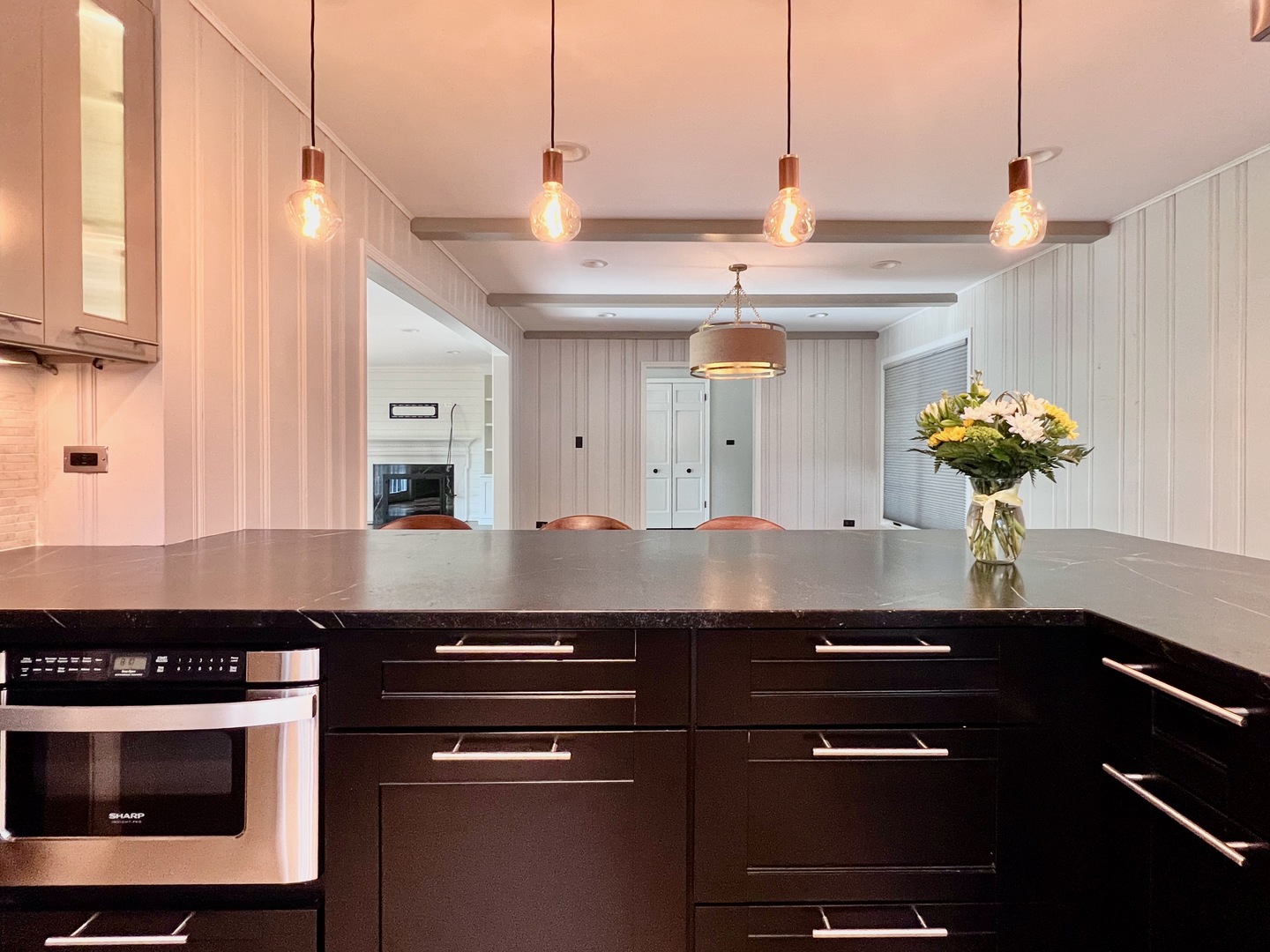 275 Cold Spring Road Barrington, IL 60010 - Photo 6 of 33 a kitchen with a sink and chandelier