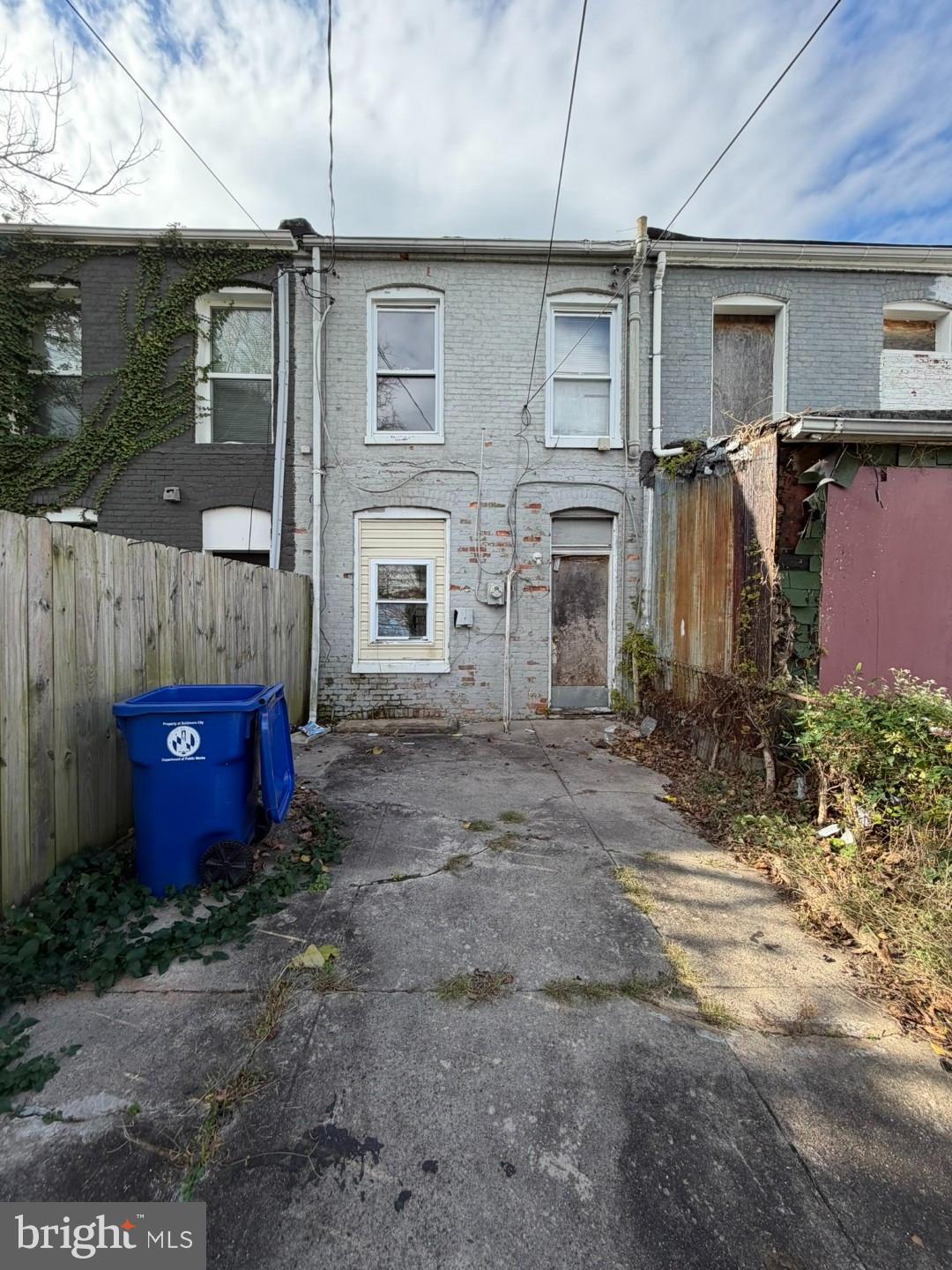 1827 North Milton Avenue Baltimore, MD 21213 - Photo 47 of 49 a view of a house with a backyard