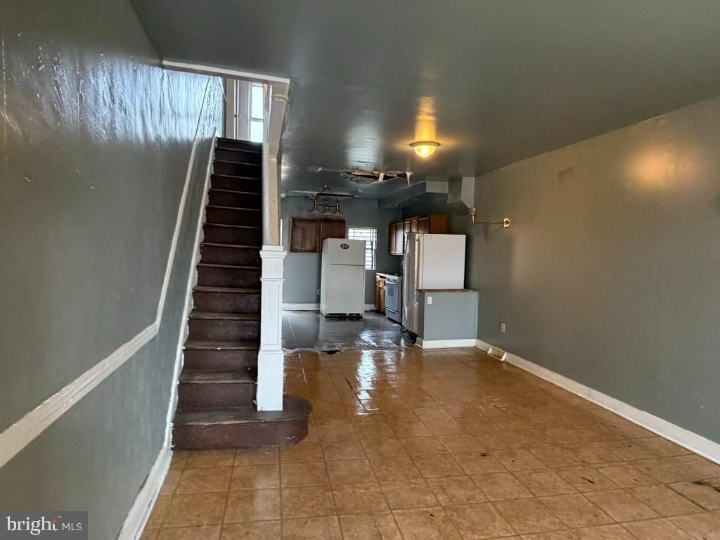 1827 North Milton Avenue Baltimore, MD 21213 - Photo 5 of 49 a view of entryway and hall