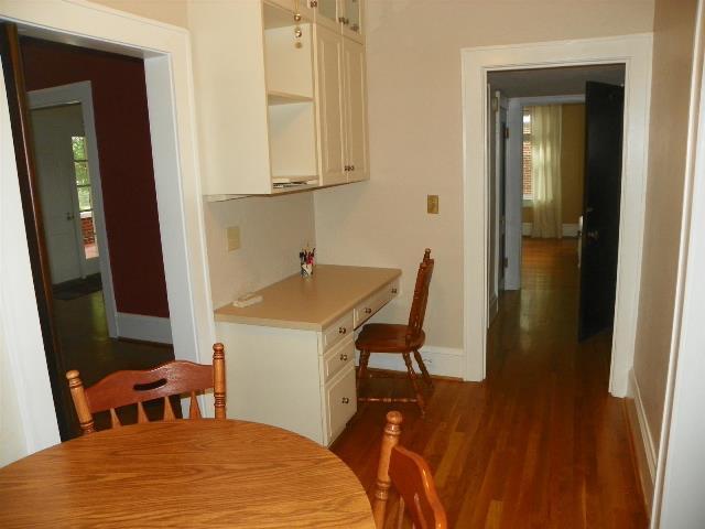 2107 Carter Road Southwest Roanoke, VA 24015 - Photo 6 of 18 a bedroom with a bed and a table in it