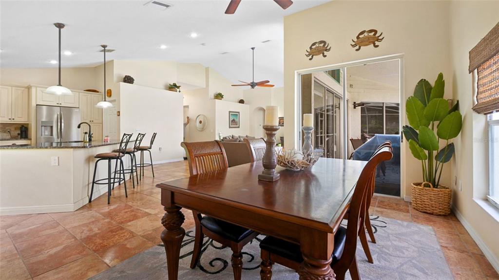 3202 Fox Squirrel Lane Valrico, FL 33596 - Photo 13 of 48 a view of a dining room with furniture