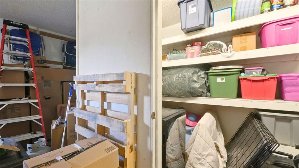 3202 Fox Squirrel Lane Valrico, FL 33596 - Photo 25 of 48 a view of walk in closet with clothes and shoes