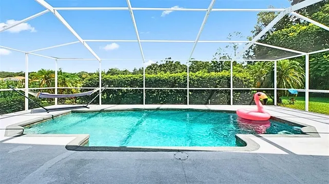a view of a backyard with potted plants and empty room