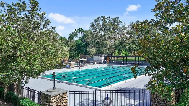 a view of a chairs and table on the deck