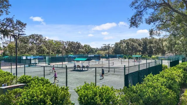a view of a garden with sitting area