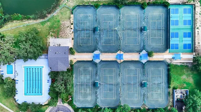 a wooden bench sitting in front of a building