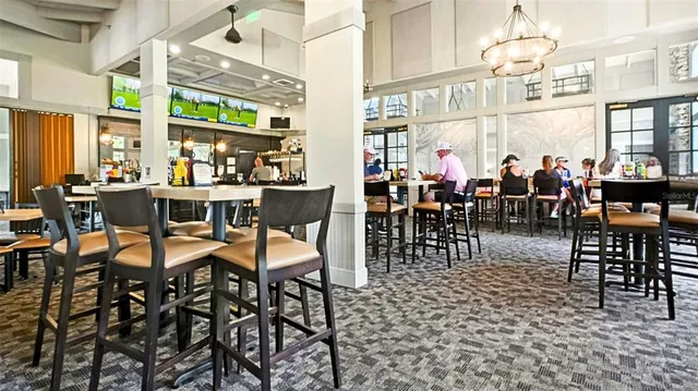 an entryway of a house with wooden floor