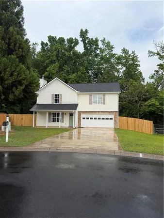 a view of house with outdoor space and street view