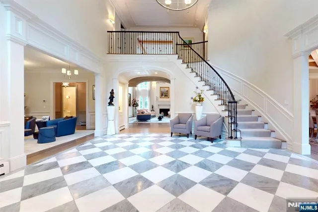 a view of a hallway with a black white checkered floor