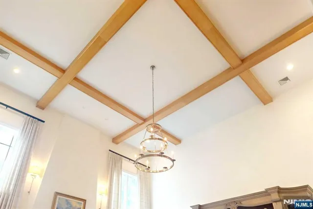 a view of a hallway with windows